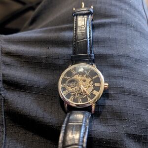 Black and Gold Skeleton Watch